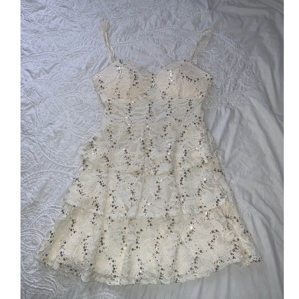 Cream ruffled dress, gold sequences